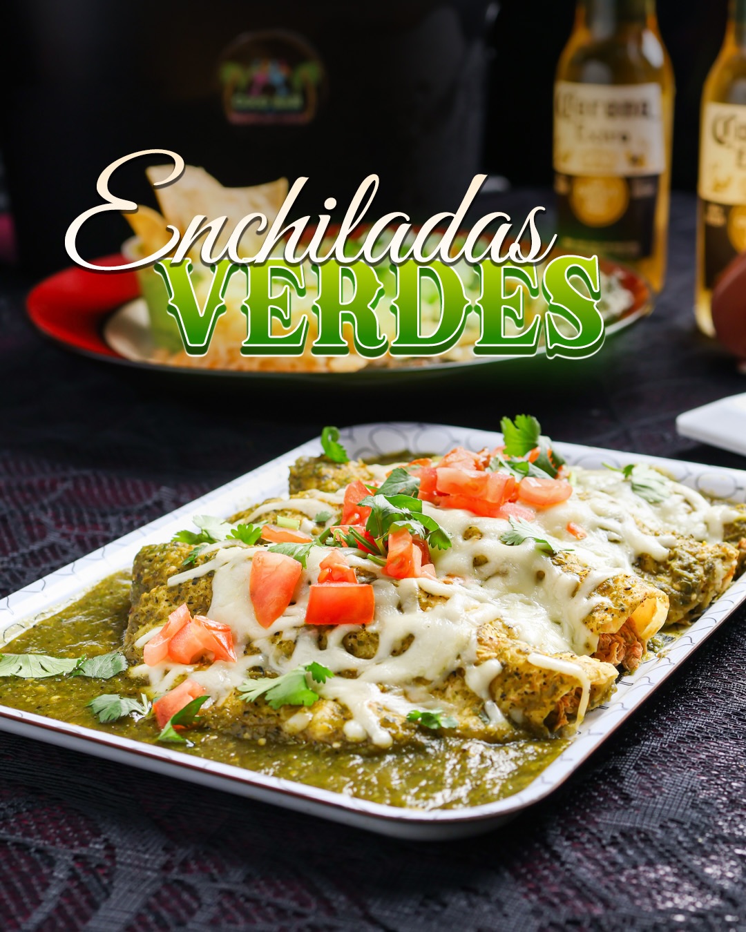 Enchiladas verdes with melted cheese and fresh toppings at Coco Bar